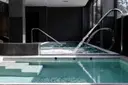 Exclusive 2 bedroom apartment with 1 garage space and spa and gym area 2